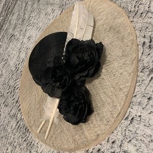 Cream and black derby style hat